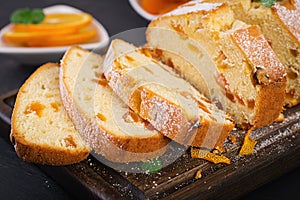 Orange cake with dried apricots and powdered sugar