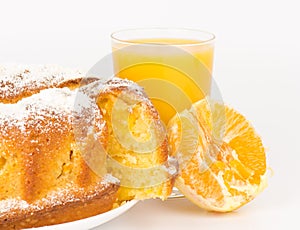 Orange cake with orange juice and orange's slice.