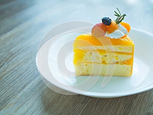 Orange cake with topping mix fruit