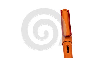 Orange calligraphic or fountain pen isolated on white background