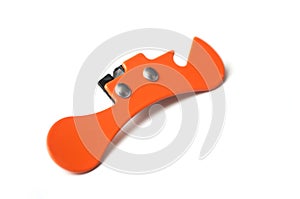 orange can opener on white background