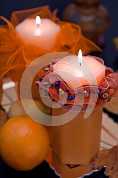 Orange candles in the dark