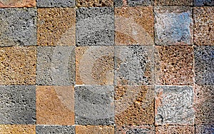 Orange checkerboard pattern wall and floor texture in Mexico