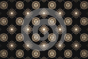 Orange checkered pattern of squares and circles on a black background.