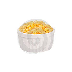 Orange chili corn sticks in white ceramics bowl isolated on white background.