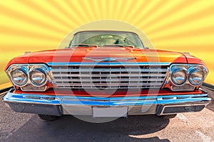 Orange and chromed old sixty brand car photo