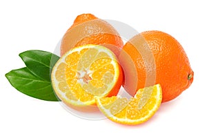 Orange clementine or minneola tangelo with slices and green leaves isolated on white background. Tangerine. Citrus fruit