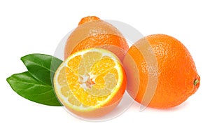 Orange clementine or minneola tangelo with slices and green leaves isolated on white background. Tangerine. Citrus fruit