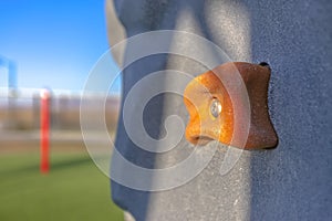 Orange climbing stone on playground in Utah