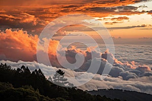 Orange clouds in the sky above cloud inversion