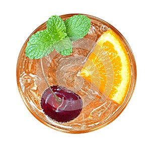 Orange cocktail with cherry and mint top view isolated on white