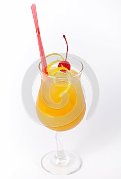 Orange cocktail drink with lemon and cherry