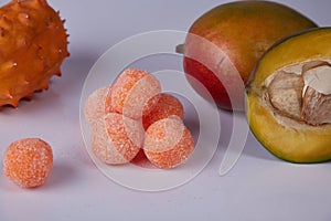 Orange color fresh ball sweets candy sugar free organic healthy food tasty flavor juicy fruit mango or cosmetic scrub for body