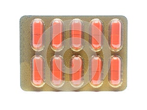 Orange color gelatin capsules pills in blister pack