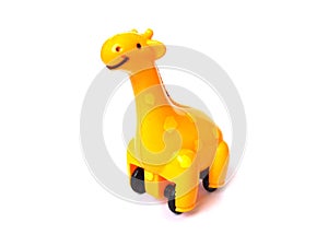 Orange color plastic giraffe toy.