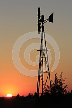 Orange colorful Sunset with a Windmill silhouette