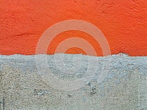 Orange concrete wall and unpainted walls.