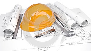 Orange construction helmet on the drawings