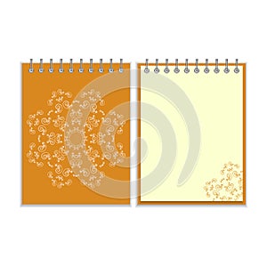 Orange cover notebook with round ornate star