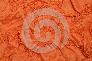 Orange crumpled textile background