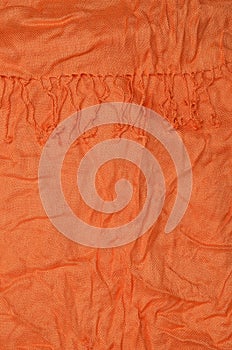 Orange crumpled textile background