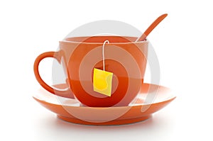 Orange cup with tea bag