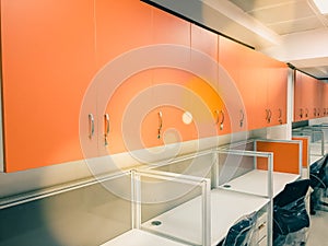 Orange cupboards in an office
