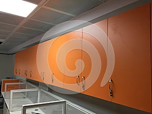 Orange cupboards in an office