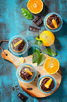 Orange Cupcakes with Chocolate Cream and Fresh Tangerines
