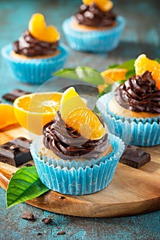 Orange Cupcakes with Chocolate Cream and Fresh Tangerines