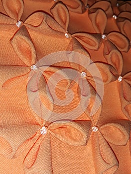 Orange cushion embossed