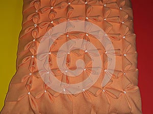 Orange cushion embossed