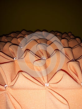 Orange cushion embossed