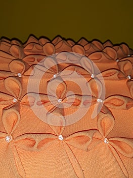 Orange cushion embossed