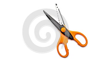 Orange and decorative scissors, included clipping path