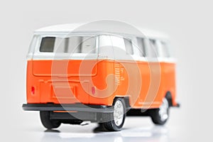 Orange diecast mini van toy