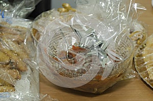 Orange dried fruit and pastries in cellophane packaging -Mikvah