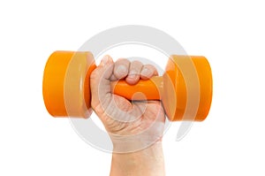 Orange dumbbell in a female hand on a white background.