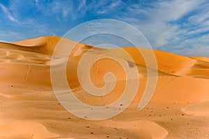 Orange dunes Abu Dhabi, beautiful orange sand dune, blue sky, white clouds, Abu Dhabi, United Arab Emirates