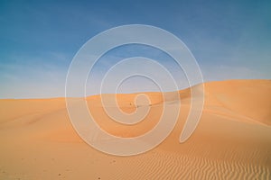 Orange dunes in desert of Abu Dhabi, beautiful orange sand dune, United Arab Emirates