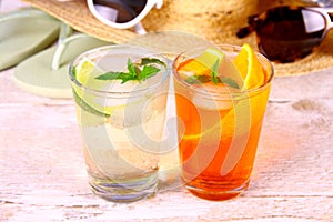 Orange and elderflower cocktails with holiday background