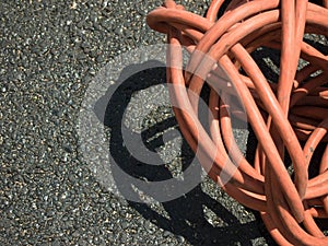 The Orange Extension Cord on the Ground at the Constructionsite