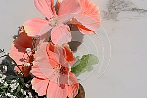 Orange fabric artificial flowers