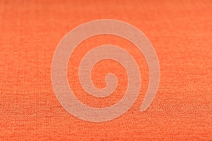 Orange fabric texture. Abstract background, empty template.