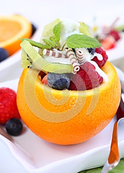 Orange filled with fruits