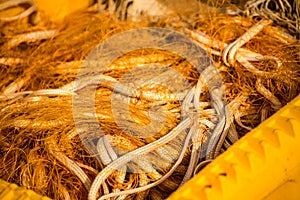 Orange fishing net on a fishing cutter