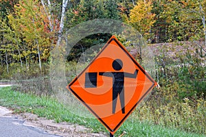 Orange Flagman Ahead Construction sign. Flagger ahead