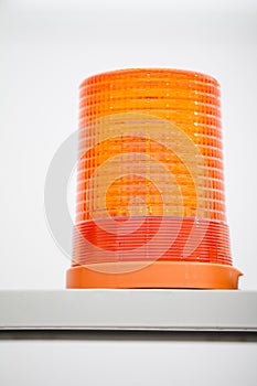 Orange flasher stand alone in exhibition