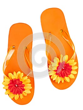 Orange flip-flops with flowers