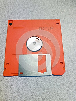 Orange floppy disk back side